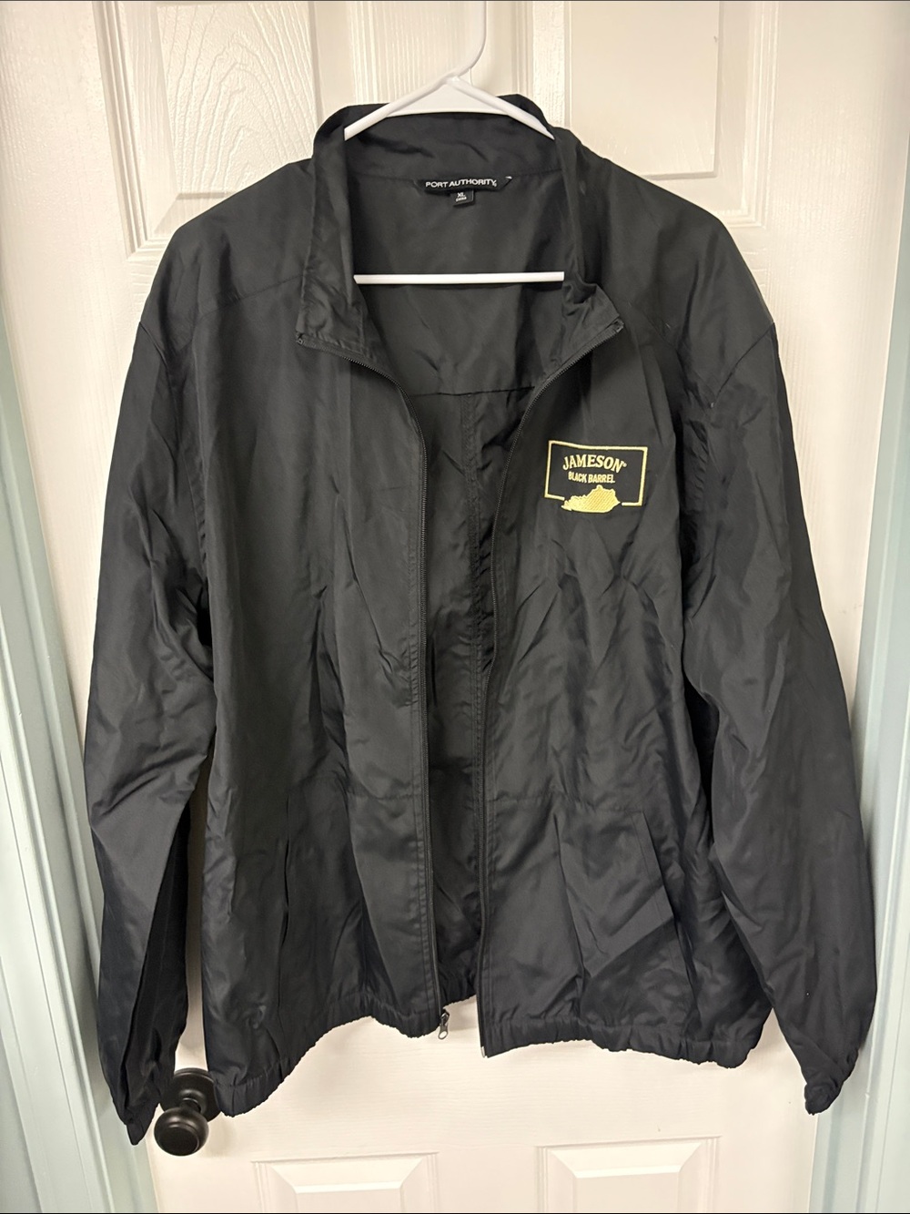 Port Authority Black Windbreaker Jacket with Yellow Jameson Patch